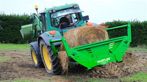 hay unroller skid steer|mounted bale unroller.